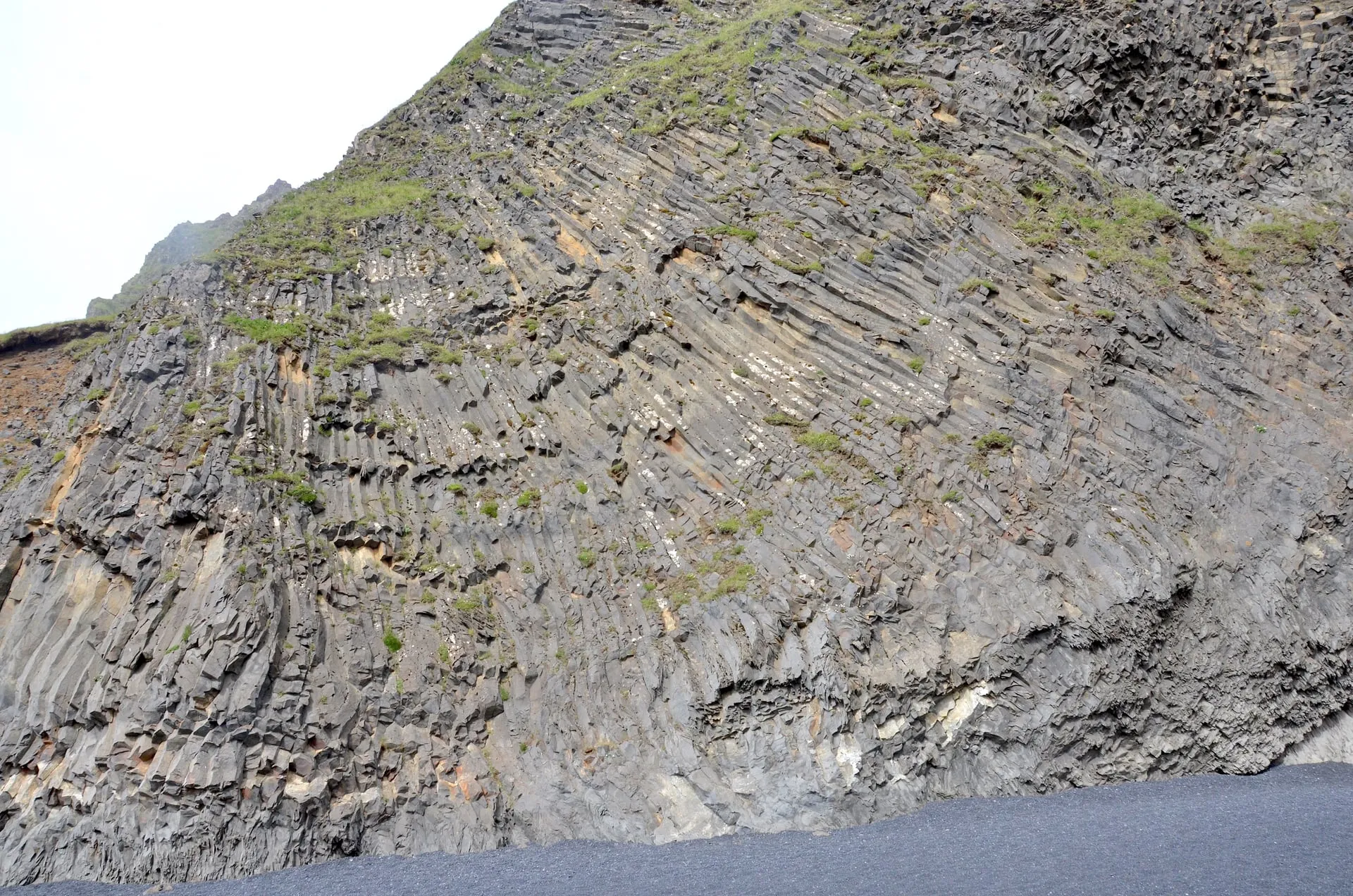 The hexagonal basalt columns of Reynisfjara black-sand beach near Vík on Iceland's South Coast