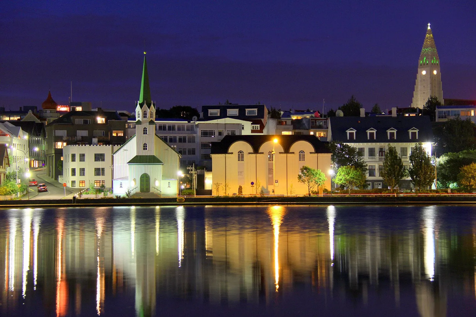 A summer-night view of central Reykjavík with Hallgrímskirkja in the distance