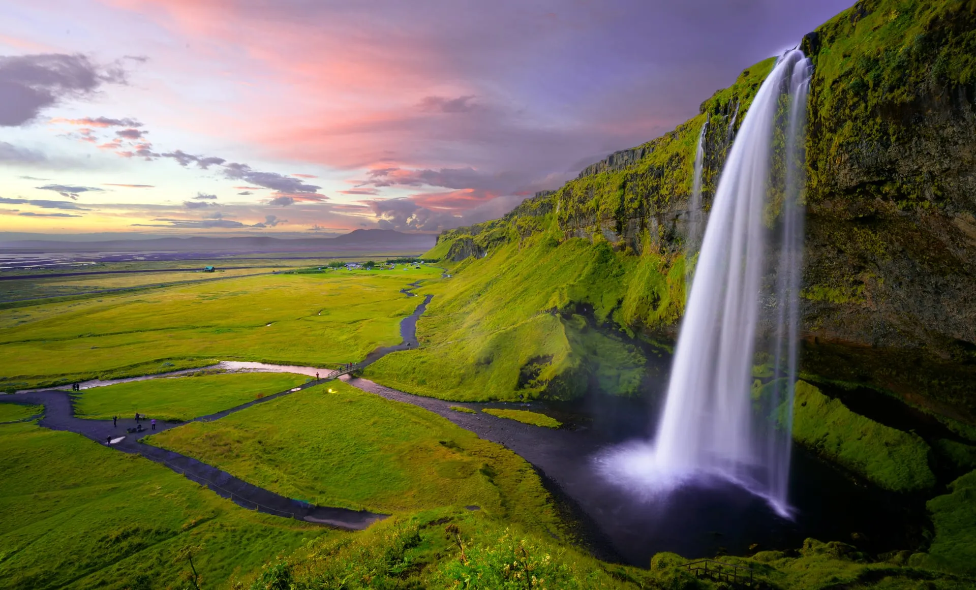 Seljalandsfoss waterfall with a path leading behind the cascade