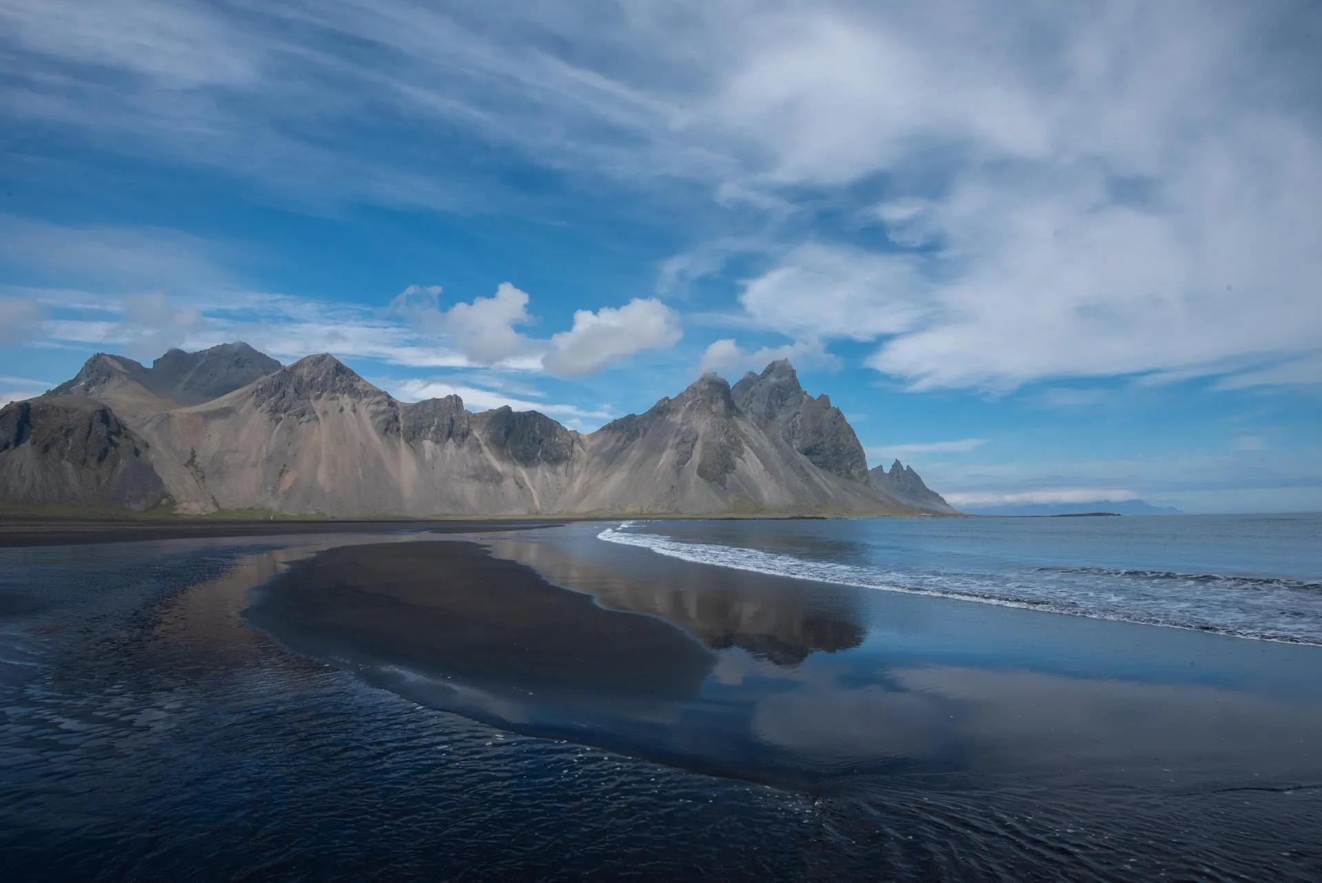 The Vestrahorn massif rising above Stokksnes black-sand beach